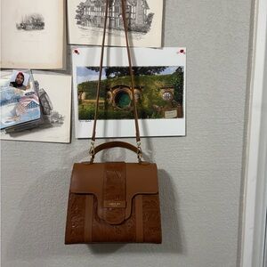 Vecceli Italy Brown Satchel with Structured Design and Flap Closure